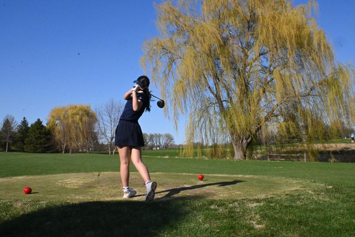 POWER DRIVE: Captain Peony Steele completes a powerful driver swing during a match this season as the team adjusts to a changing course schedule. 
