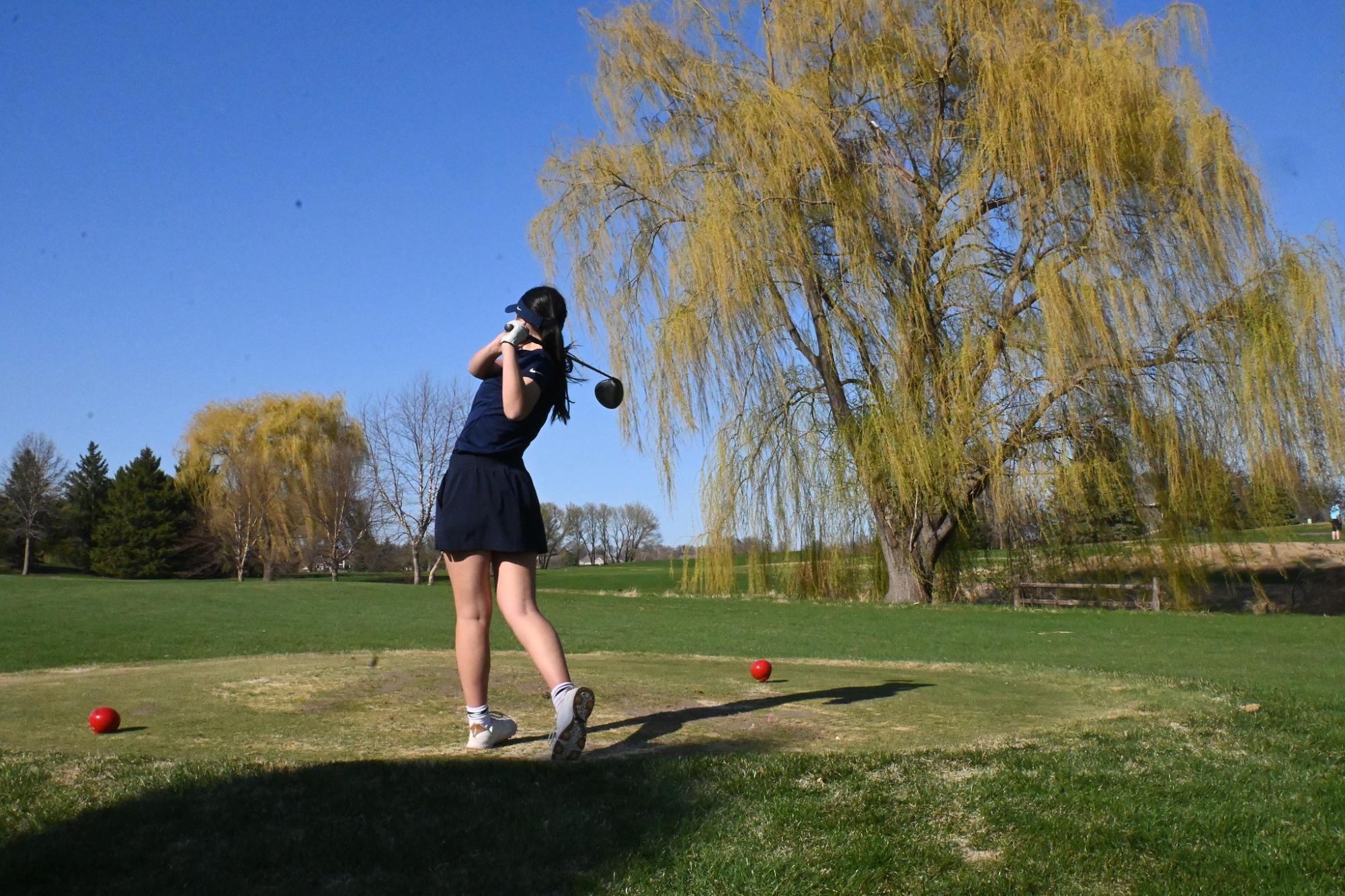POWER DRIVE: Captain Peony Steele completes a powerful driver swing during a match this season as the team adjusts to a changing course schedule. 
