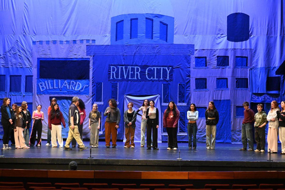 PRACTICE MAKES PERFECT. The cast of 'The Music Man' rehearses before opening night.