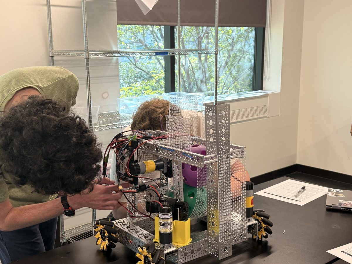 ASSEMBLING. Leo Mosenfelder works on his project during the robotics season. Mosenfelder works as the team's programmer and works heavily on designing the prototype.