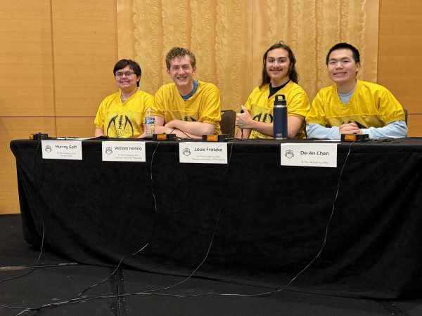 SUIT UP. The Quiz Bowl team wore vintage Spartan football jerseys on the second day of competition. The NAQT team consists of Murray Goff, William Hanna, Louis Fratzke, and De-An Chen. (Photo submitted by Kate Lockwood)