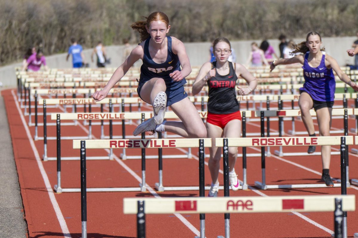 JOCELYN JUMPS. Hurdler Jocelyn Rog placed fifth in 100m hurdles at the Independent Metro Athletic Conference Championship May 14 with a time of 16:43. “If my stride gets messed up mid-race, I sometimes just have to embrace it and keep going,” Rog said.